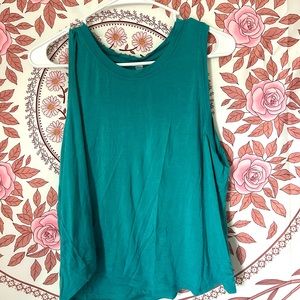 Blue Xl sized racerback, cropped shirt. Light weight and breathable.